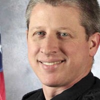 Colorado officer killed in shooting was church elder, retired figure skater